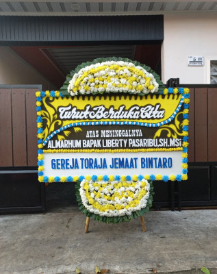 Papan Bunga Duka di Makroman